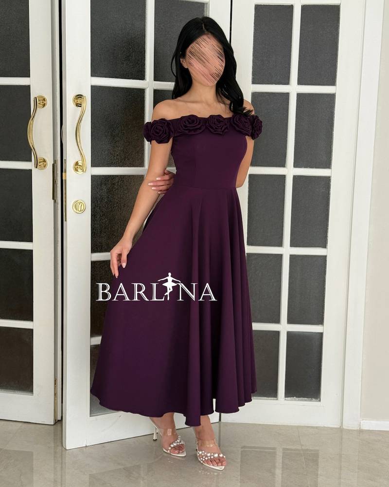 A soft purple dress decorated with roses