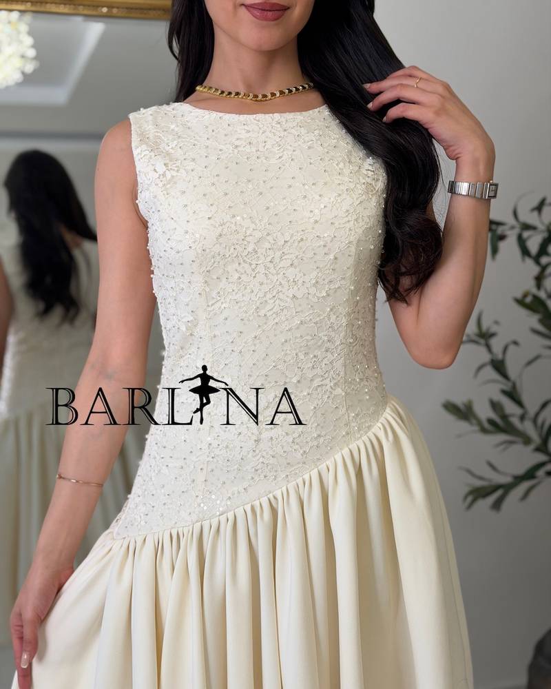 Soft midi dress with a sequined bodice