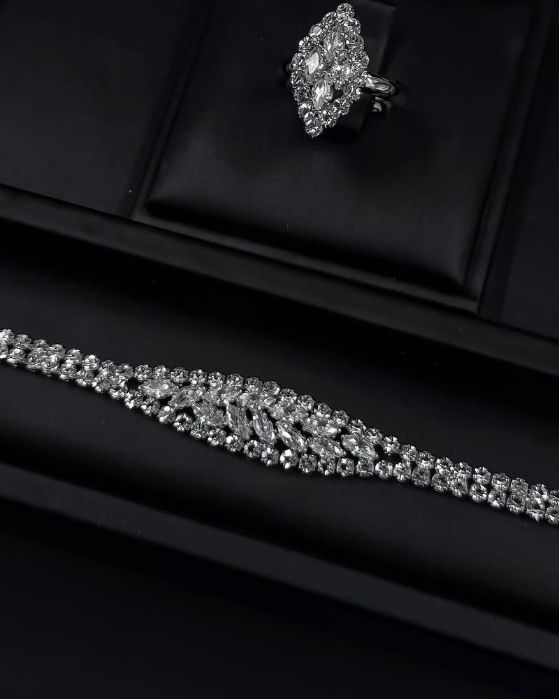 A luxurious silver accessory set with a streamlined design