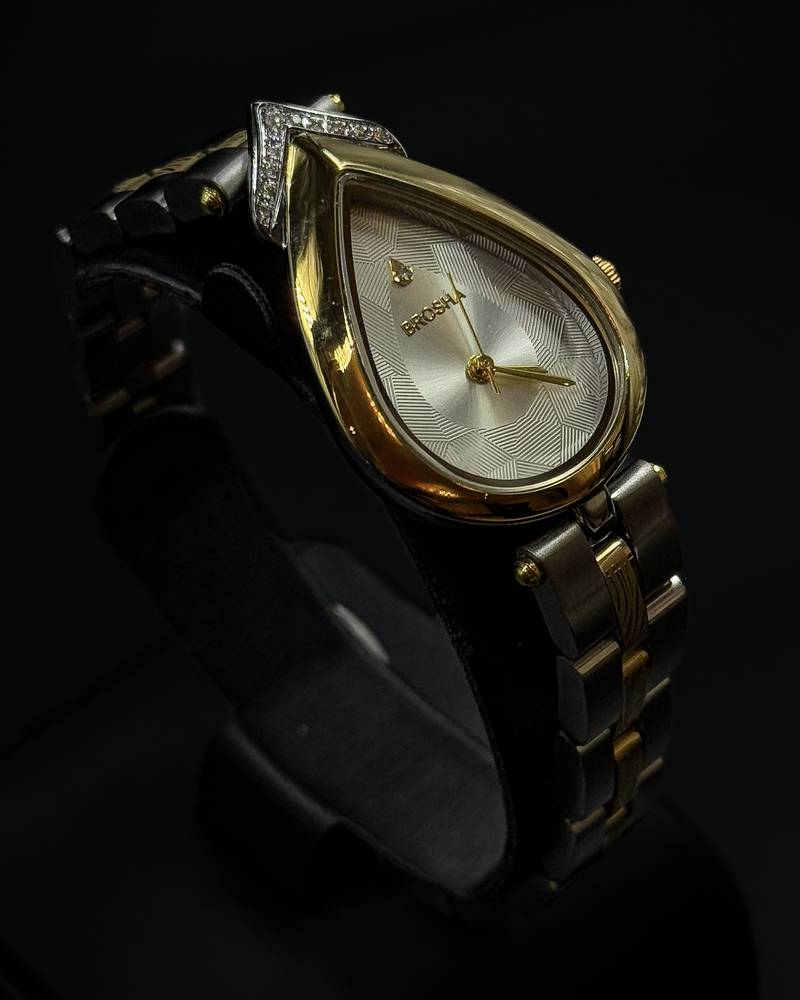 Women's watch with a teardrop-shaped bezel