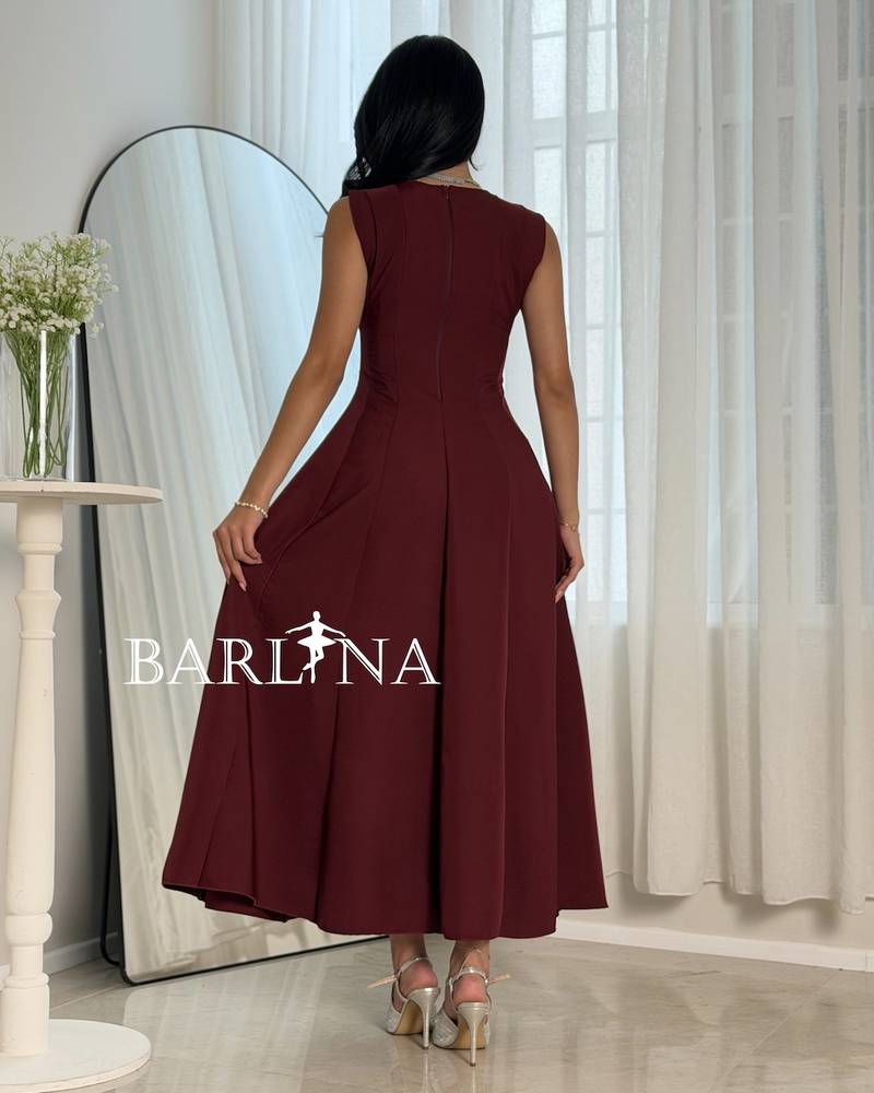 Elegant burgundy dress with a soft flared silhouette