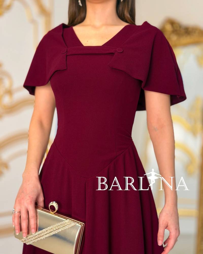 Elegant burgundy dress with a top