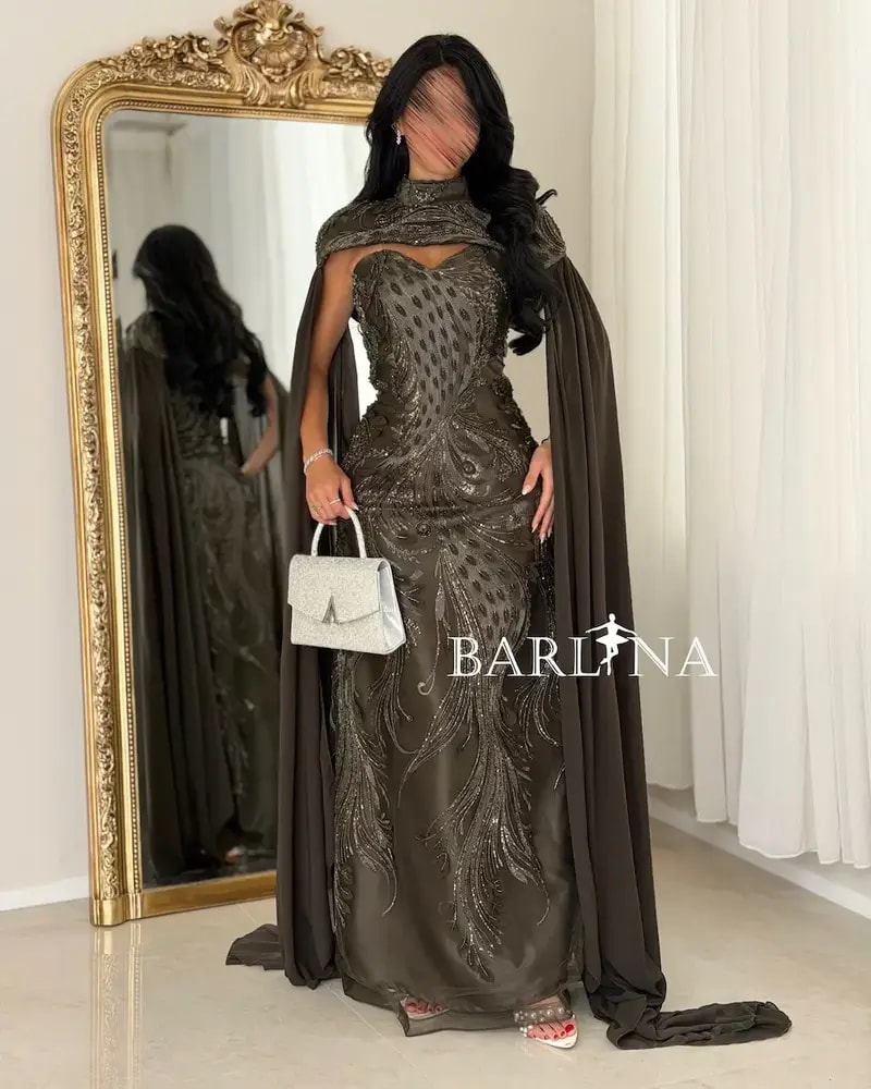 Dark brown dress with luxurious details and a cape