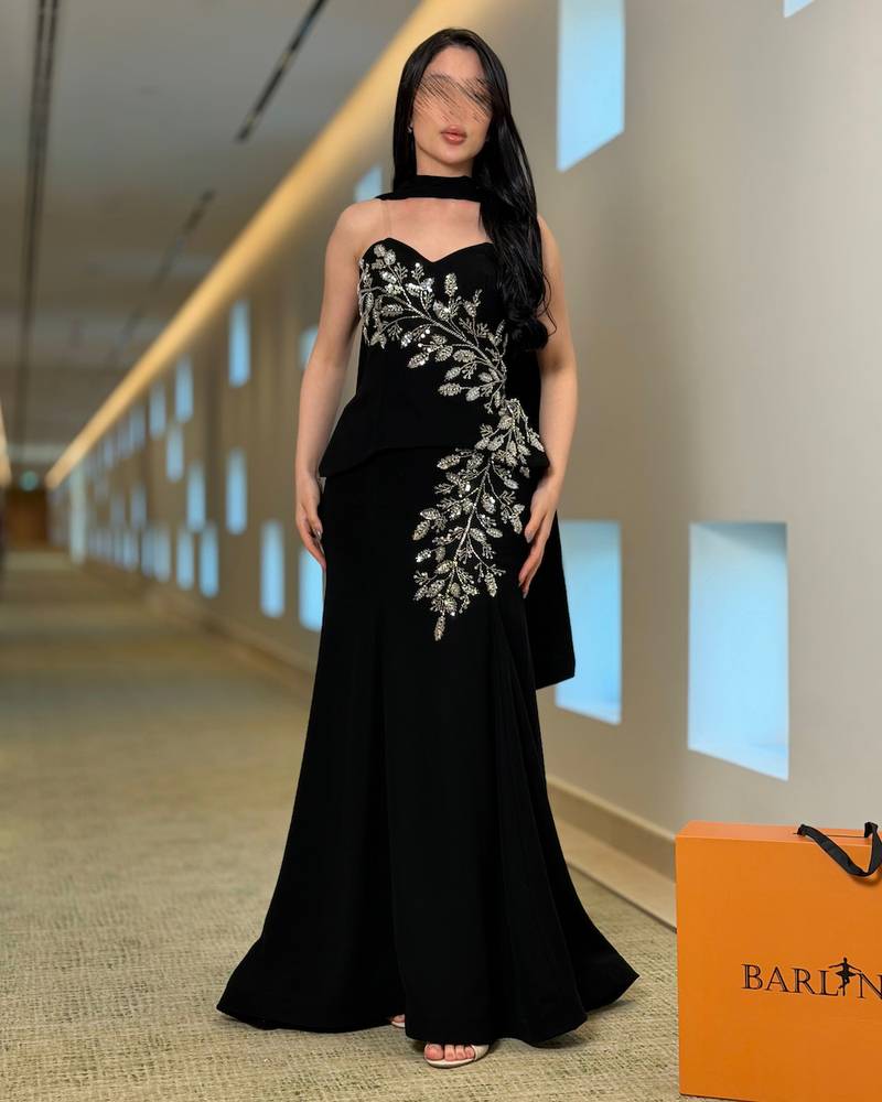Luxurious black evening dress with silver embroidery