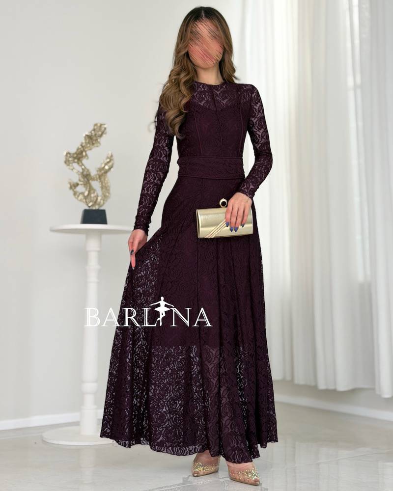 A purple lace dress with an elegant cut