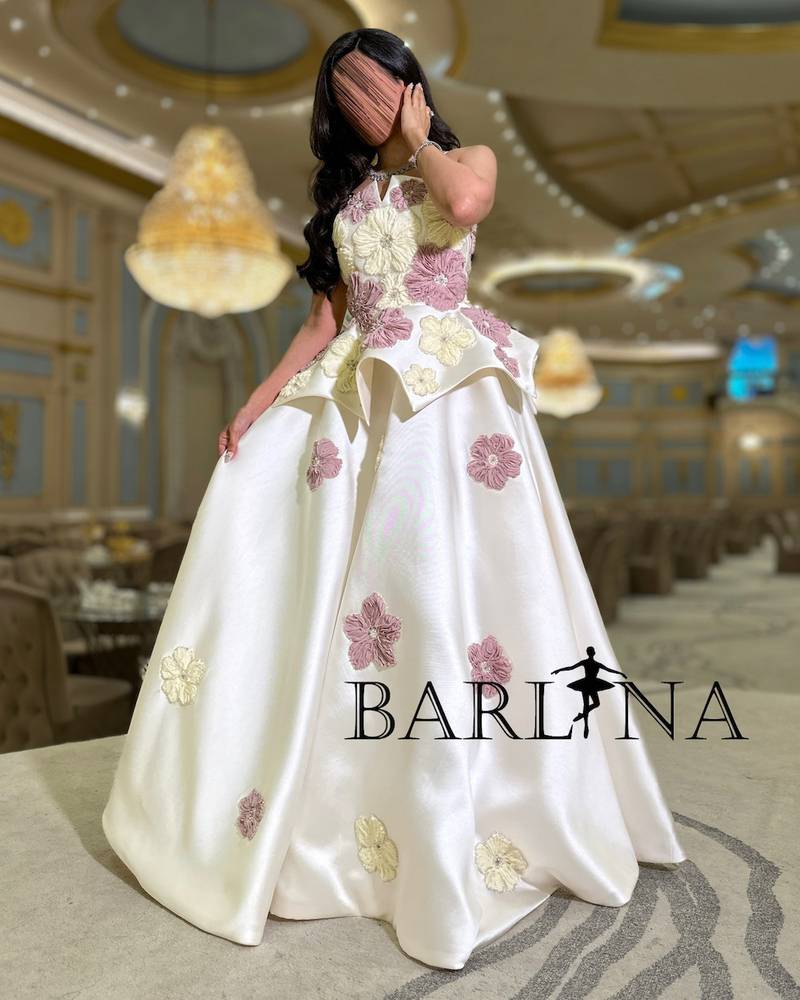 Ivory white dress with prominent embroidery