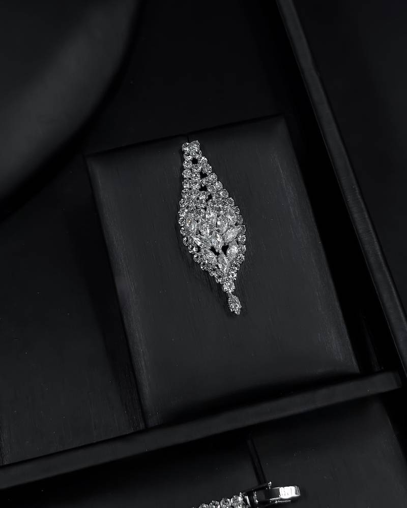 A luxurious silver accessory set with a streamlined design