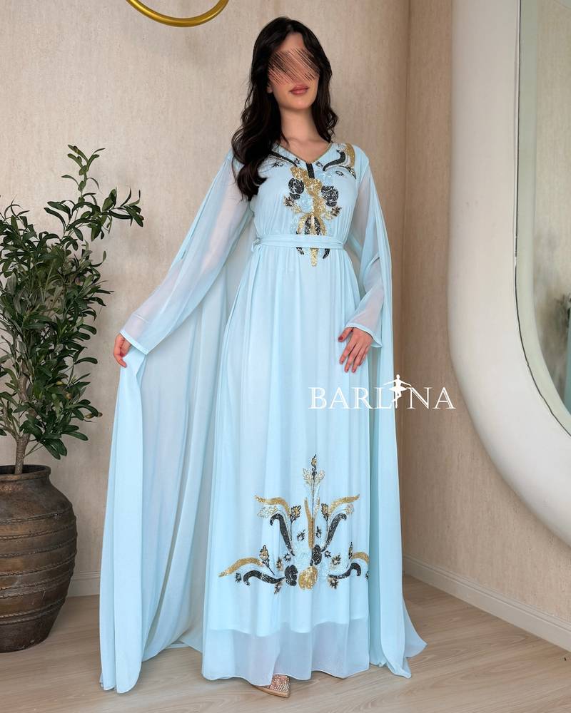Sky blue jalabiya with a collar decorated with beadwork