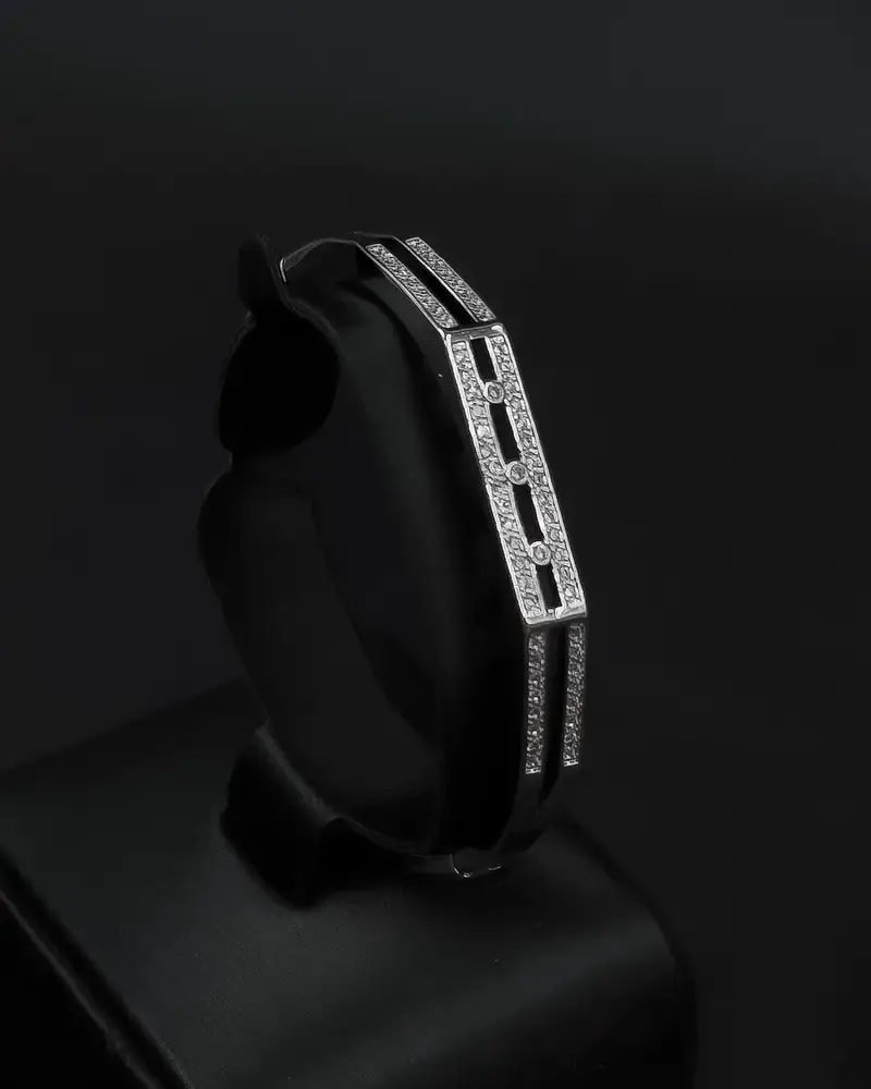 A delicate bracelet and ring with geometric, studded lines