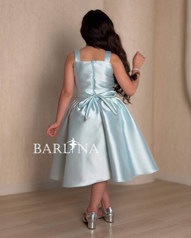 Sky blue girl's dress decorated with colorful roses