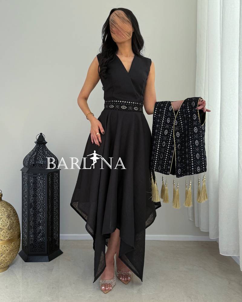 Navy blue jalabiya with an embroidered vest