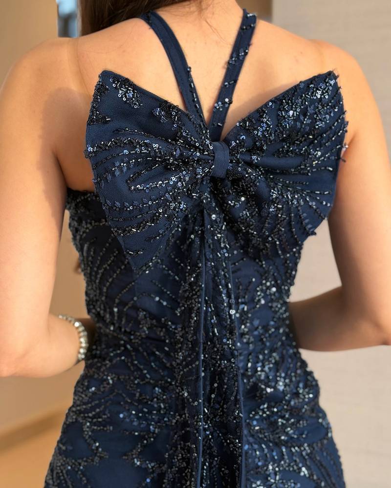 Navy blue halter evening dress with a back bow