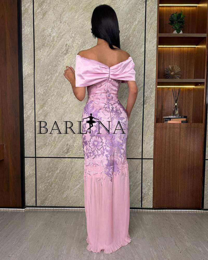 Pink dress with purple embroidery and a wrap collar