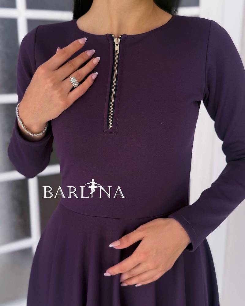 A dark purple dress with an elegant and soft design