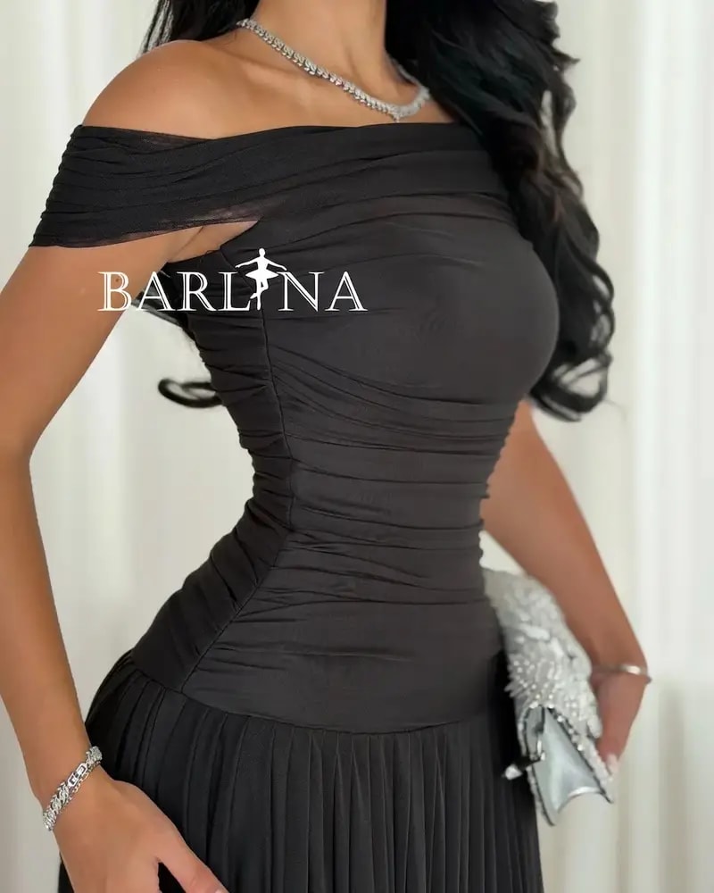 Black sleeveless dress with delicate details