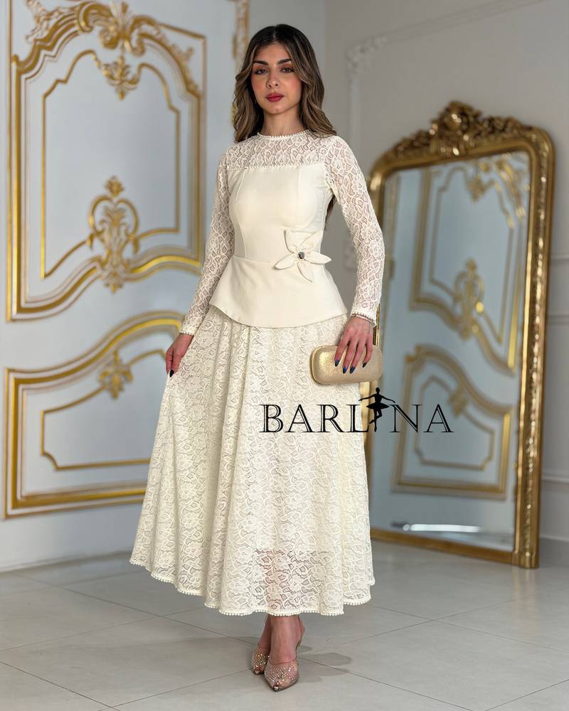 Off white lace dress with an elegant design
