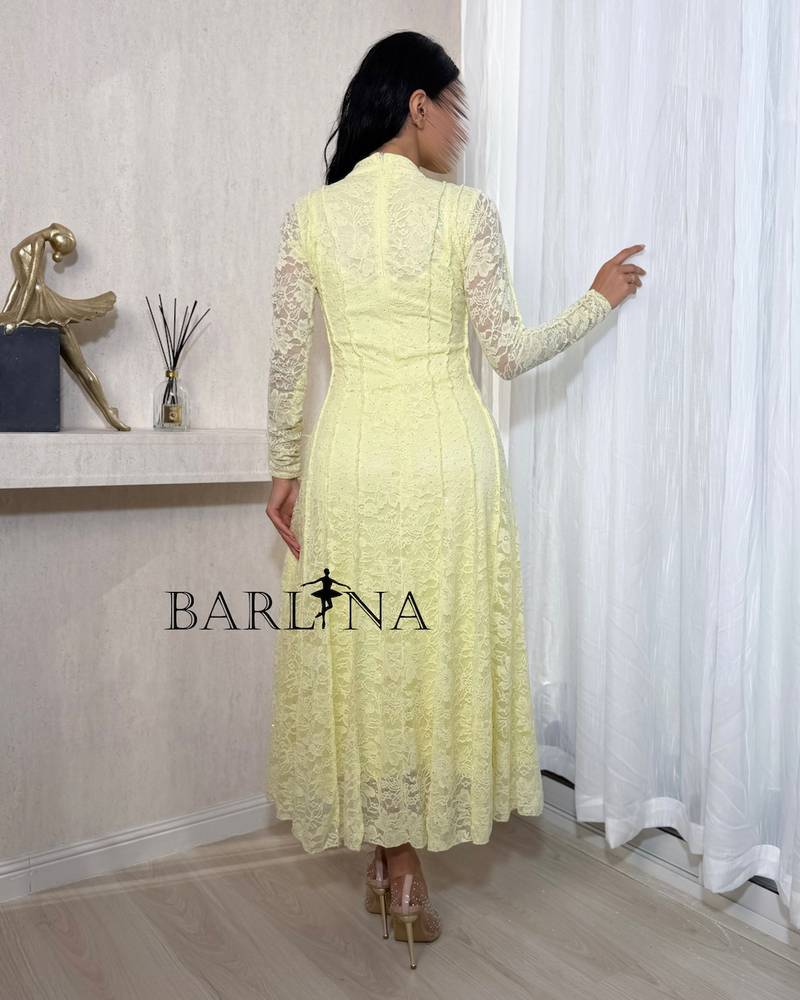 Soft yellow lace dress with long sleeves