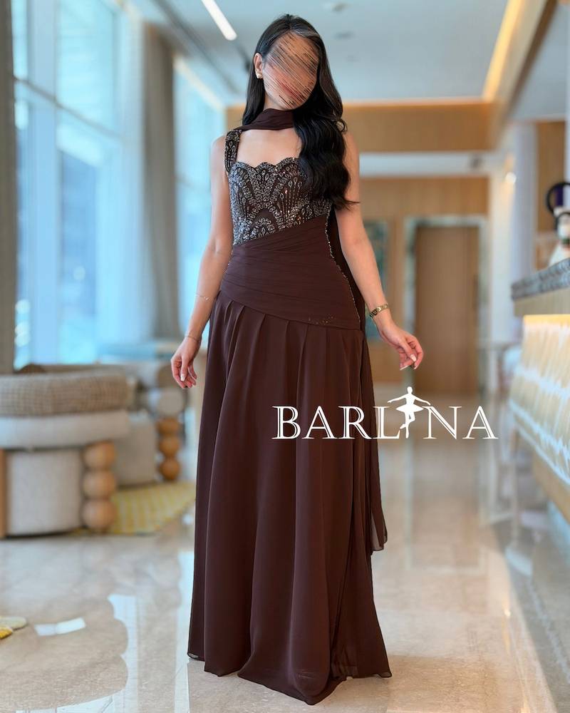 Brown evening dress with luxurious sequin embroidery