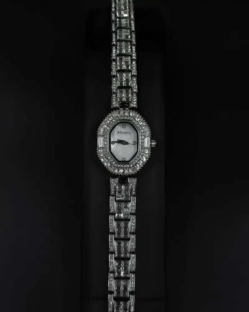 Women's evening watch with a sparkling crystal bezel