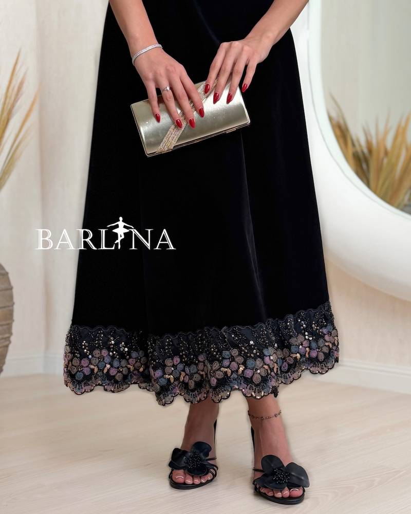 Black velvet dress with mid-length sleeves