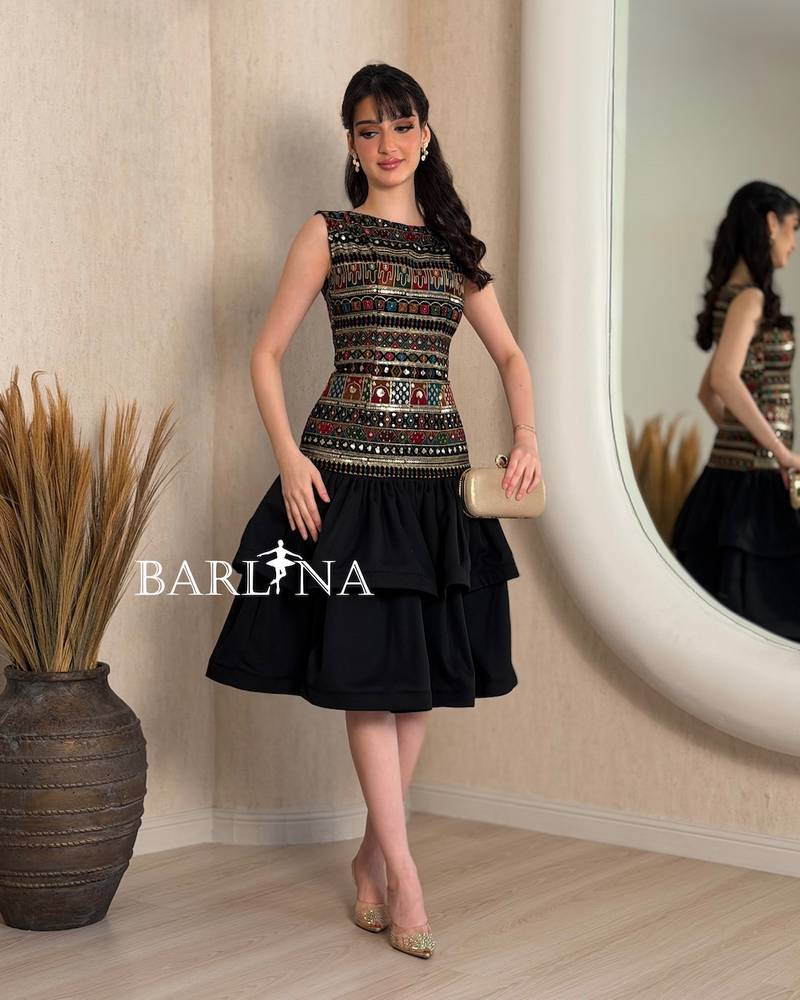 Layered dress with traditional embroidery