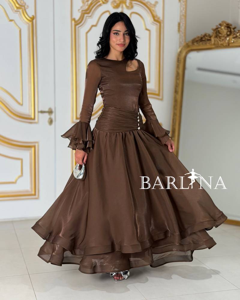 Brown dress with sheer fabric and light layers