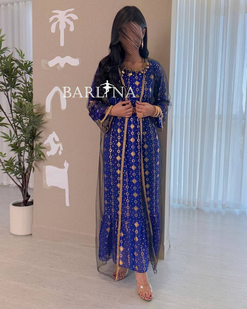 Traditional blue jalabiya with sheer abaya