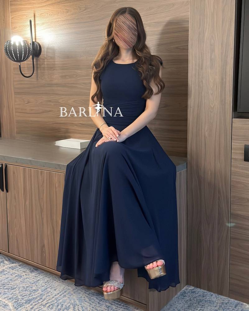 Navy blue chiffon dress with back tie detail