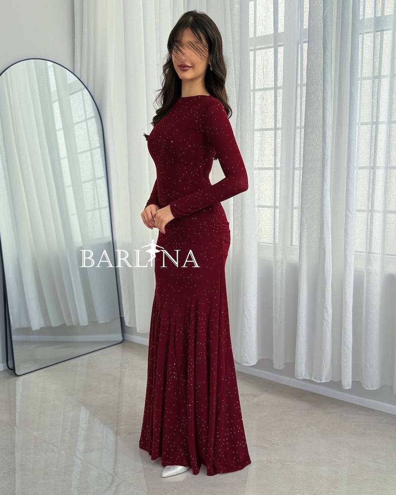 Burgundy velvet dress adorned with shimmering dots