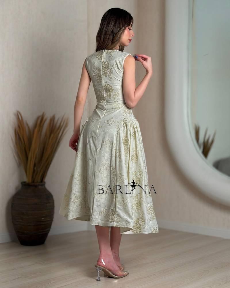 Off white lace dress with an elegant design