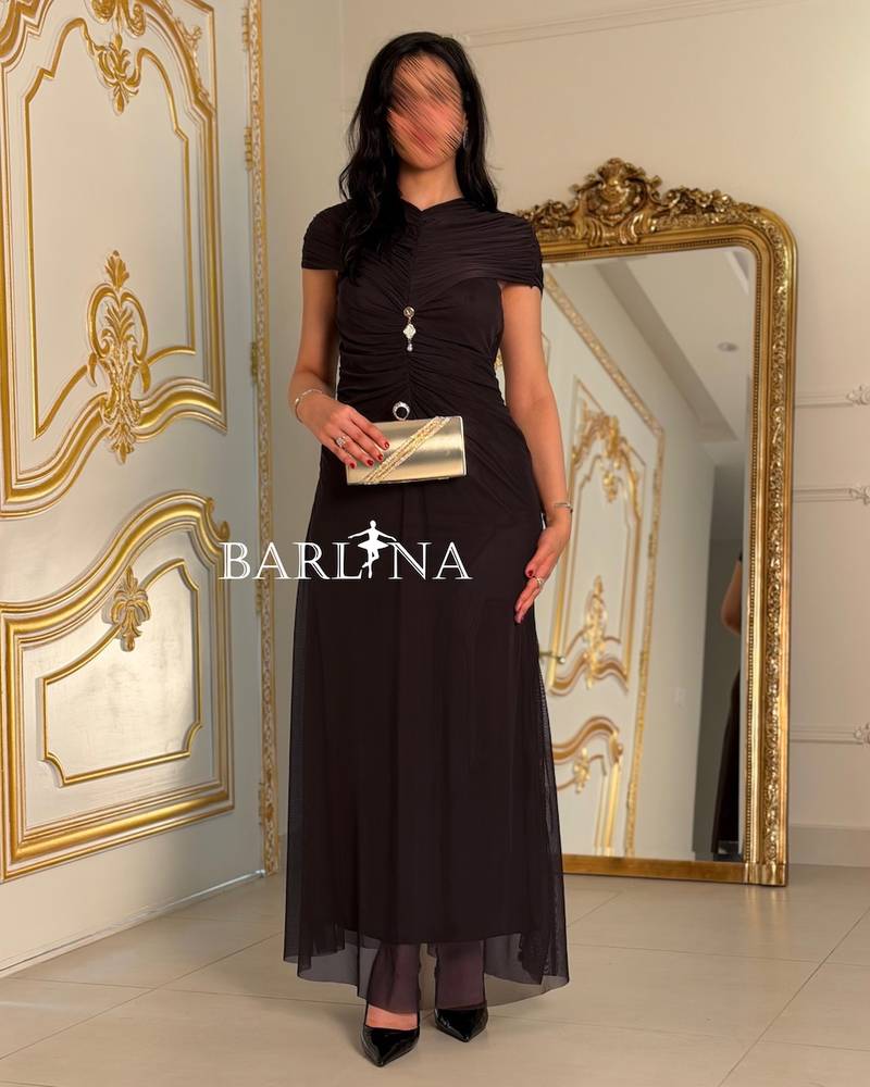 Elegant brown dress with a draped design