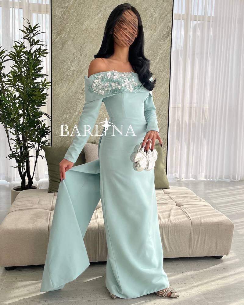 Light Tiffany dress with floral detail on the chest