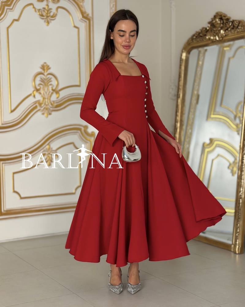 Red dress with a straight cut and pearl side buttons