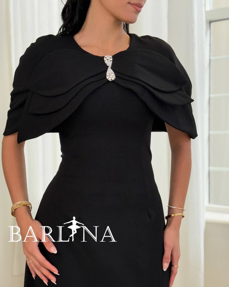 A soft black dress with crystal detailing