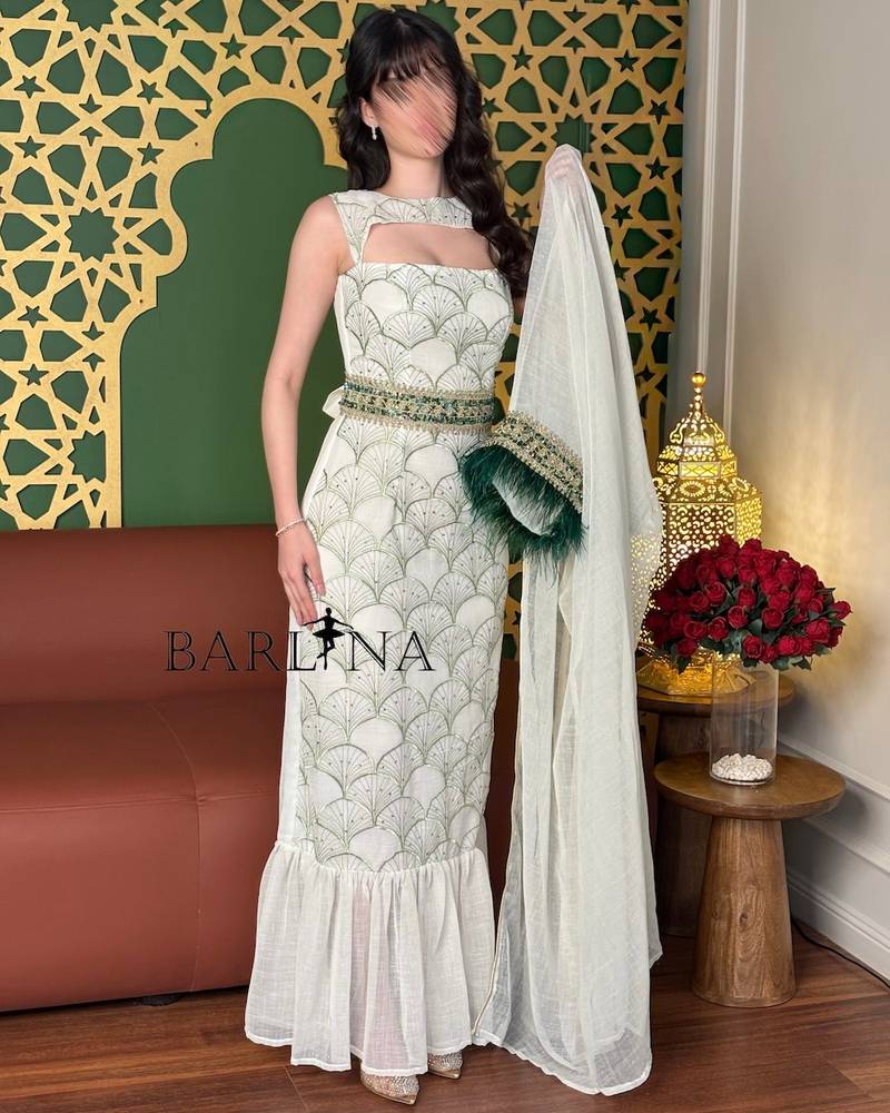Elegant off-white jalabiya with light green embroidery