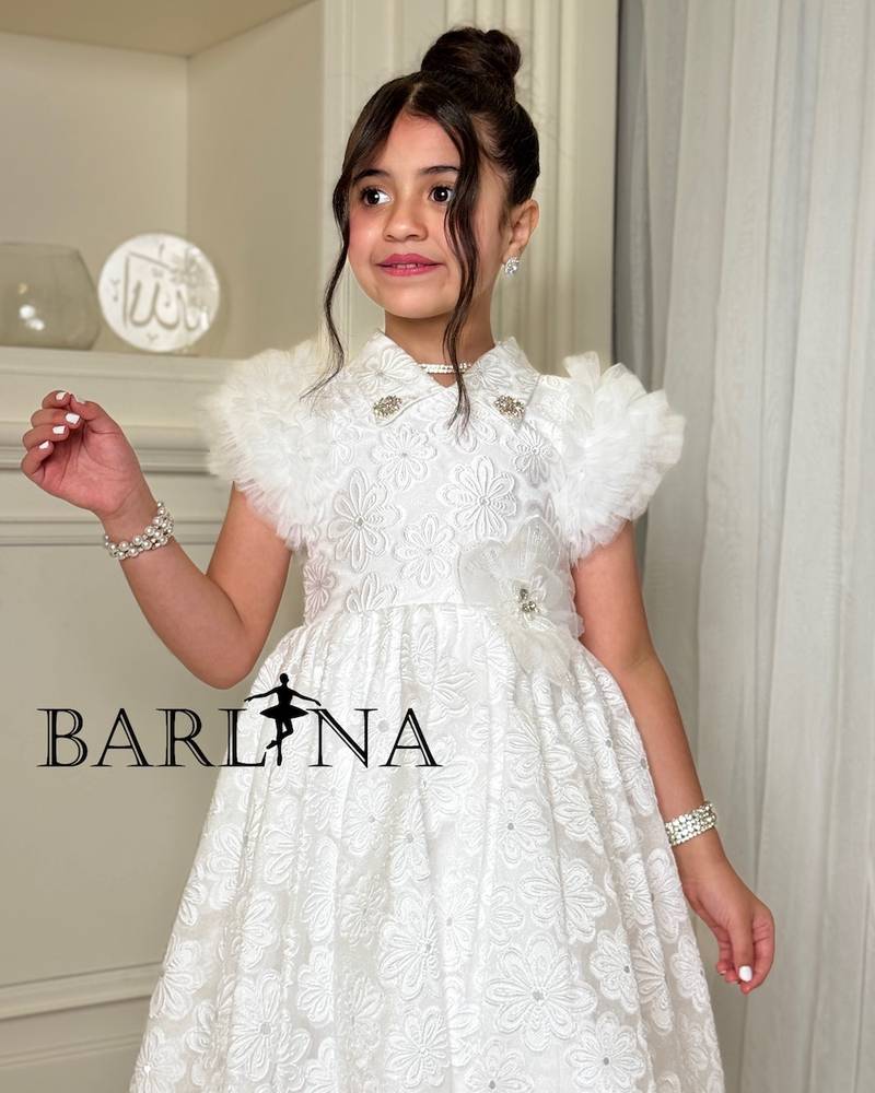 Girls' white dress with floral fabric