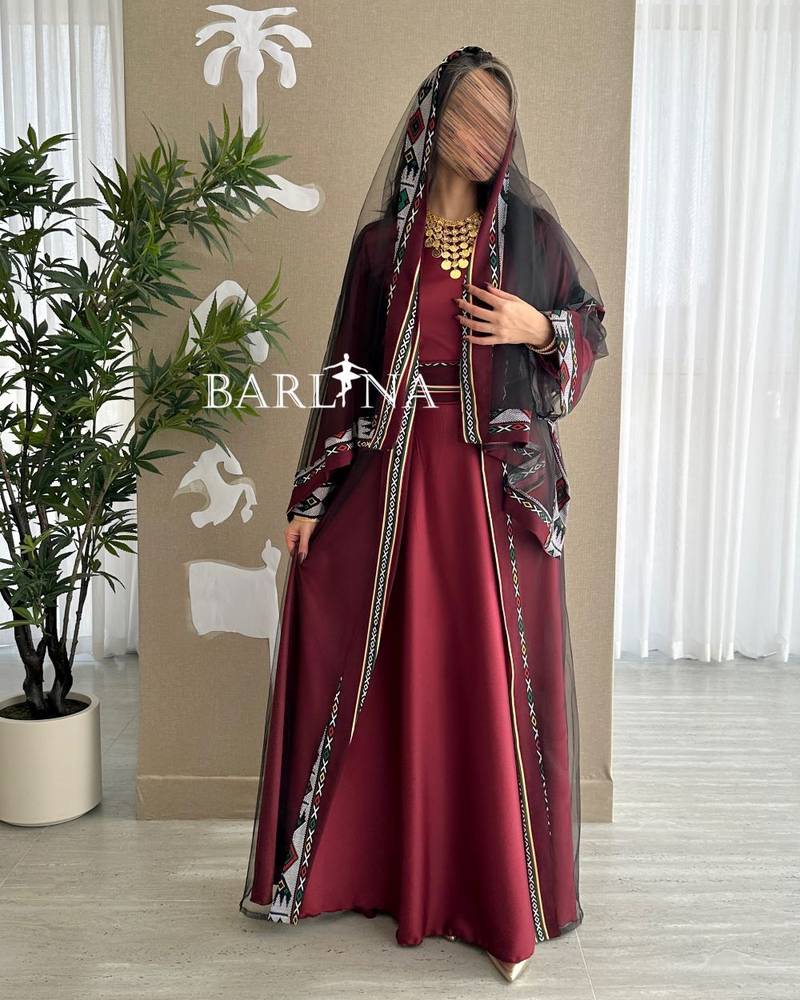 Elegant maroon jalabiya with traditional embroidery