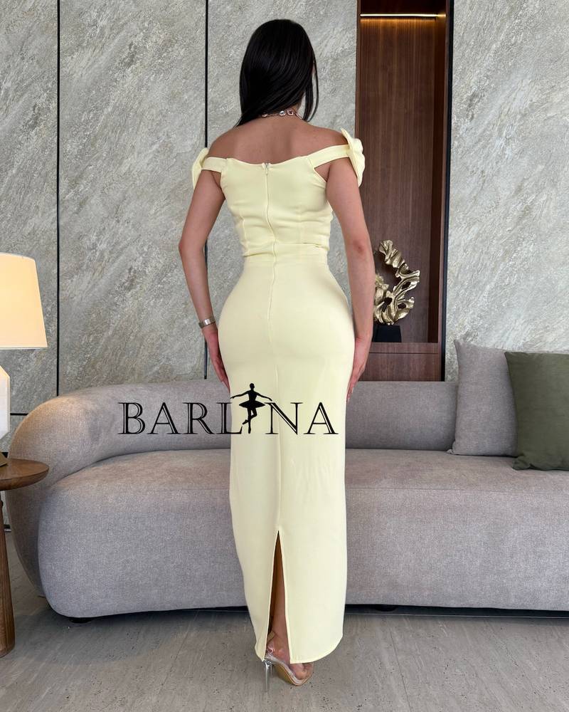 Lemon yellow dress with bow-embellished sleeves