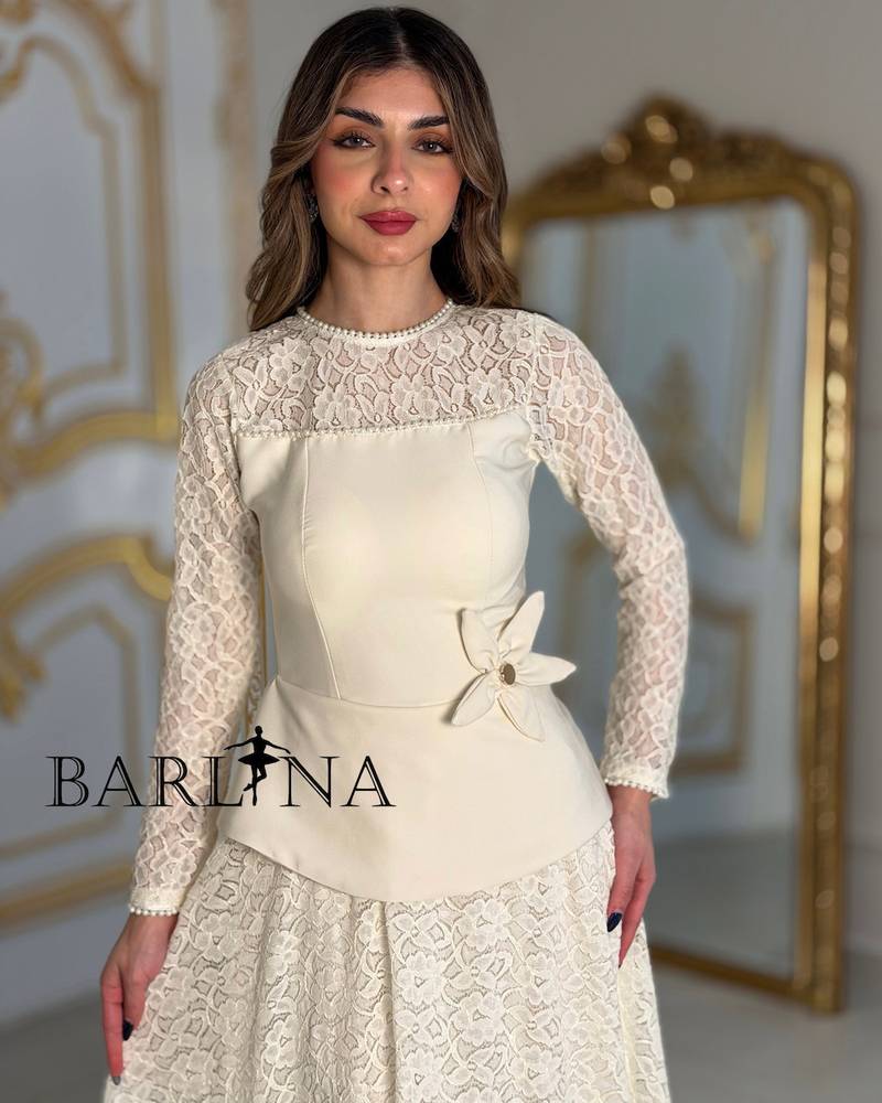 Off white lace dress with an elegant design
