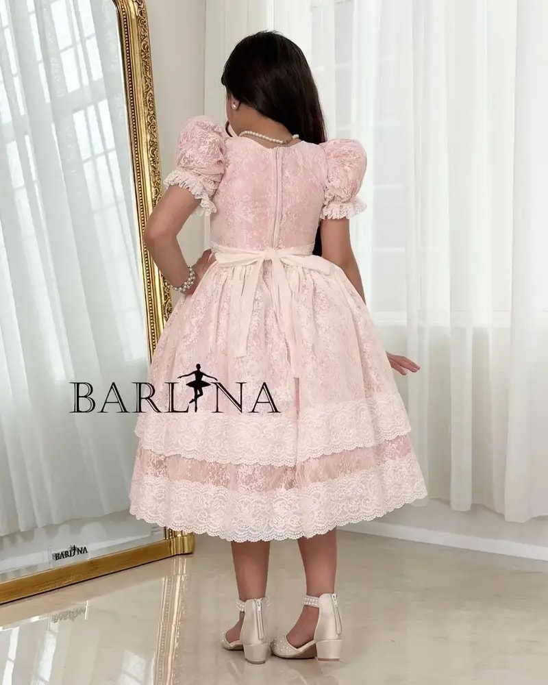 Light pink girls' dress with elegant lace