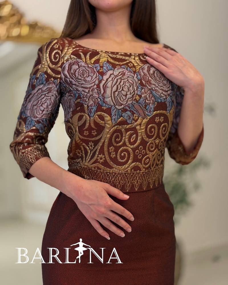 Black midi dress with a gold embroidered overlay