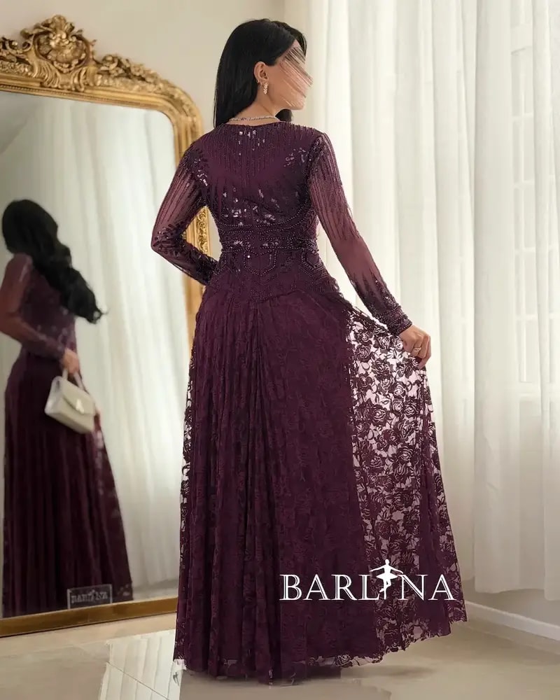 Lace evening dress with embroidered bodice