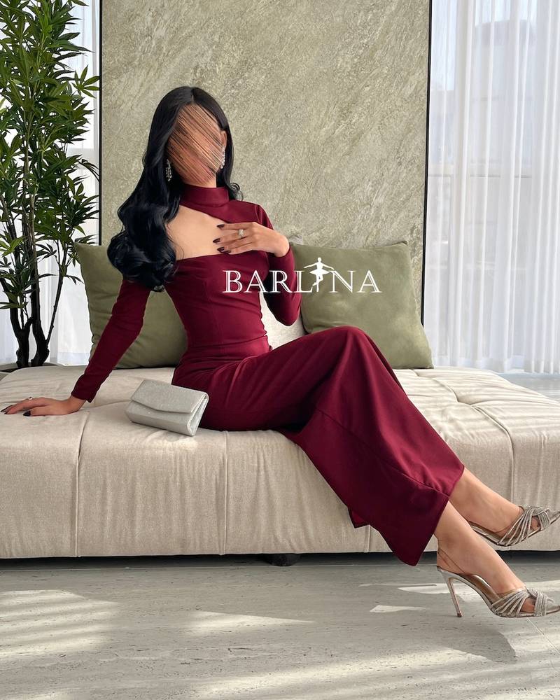 Burgundy dress with a slim design and a distinctive collar