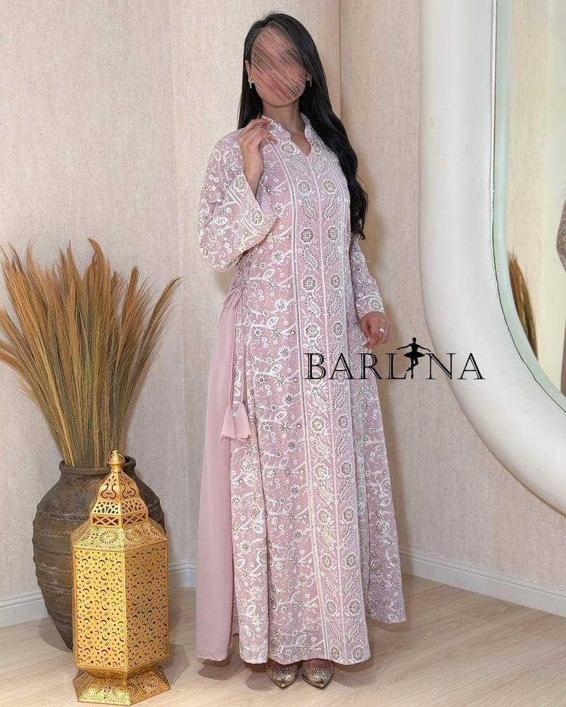 jalabeya with white embroidery and a side tie