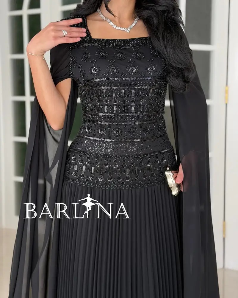 Dress with shimmering embroidery on the bodice