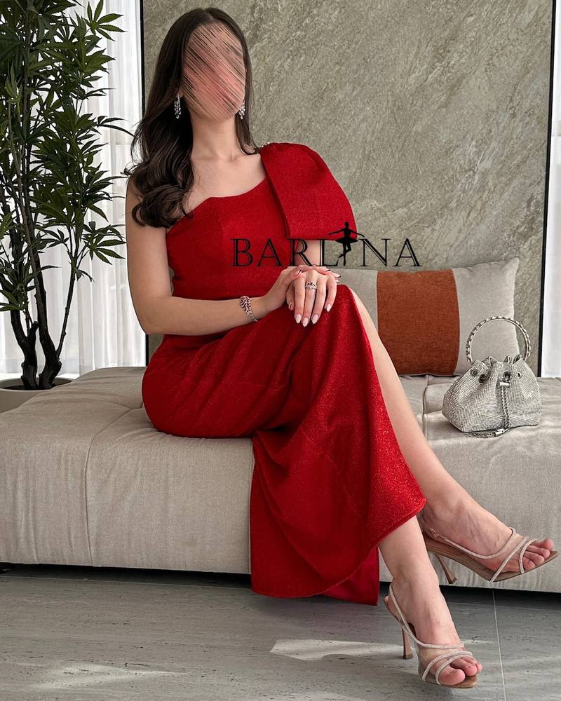 Red one shoulder dress with big bow