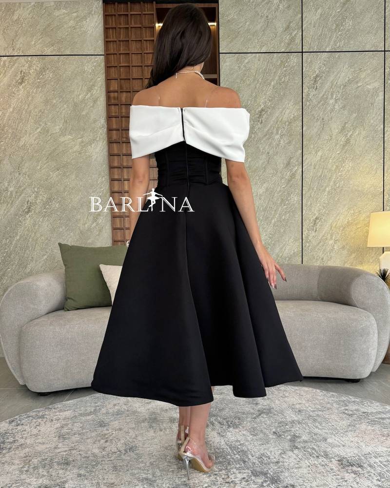 Black corset dress with white flower