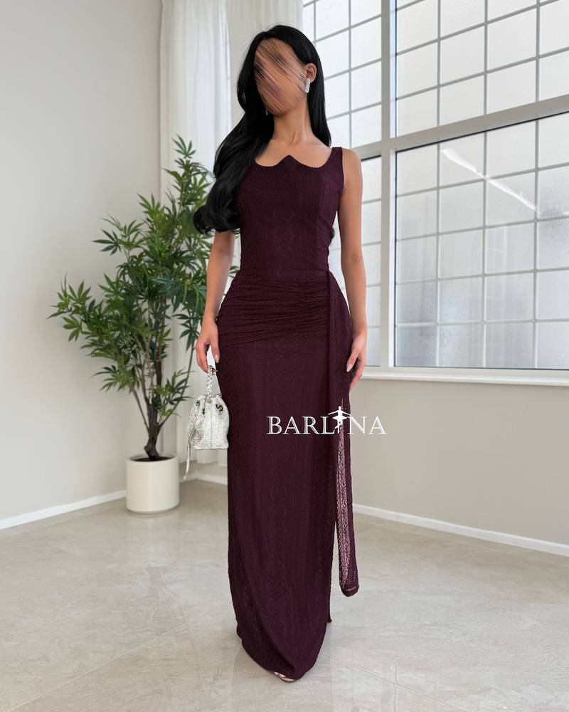 A luxurious burgundy draped lace dress