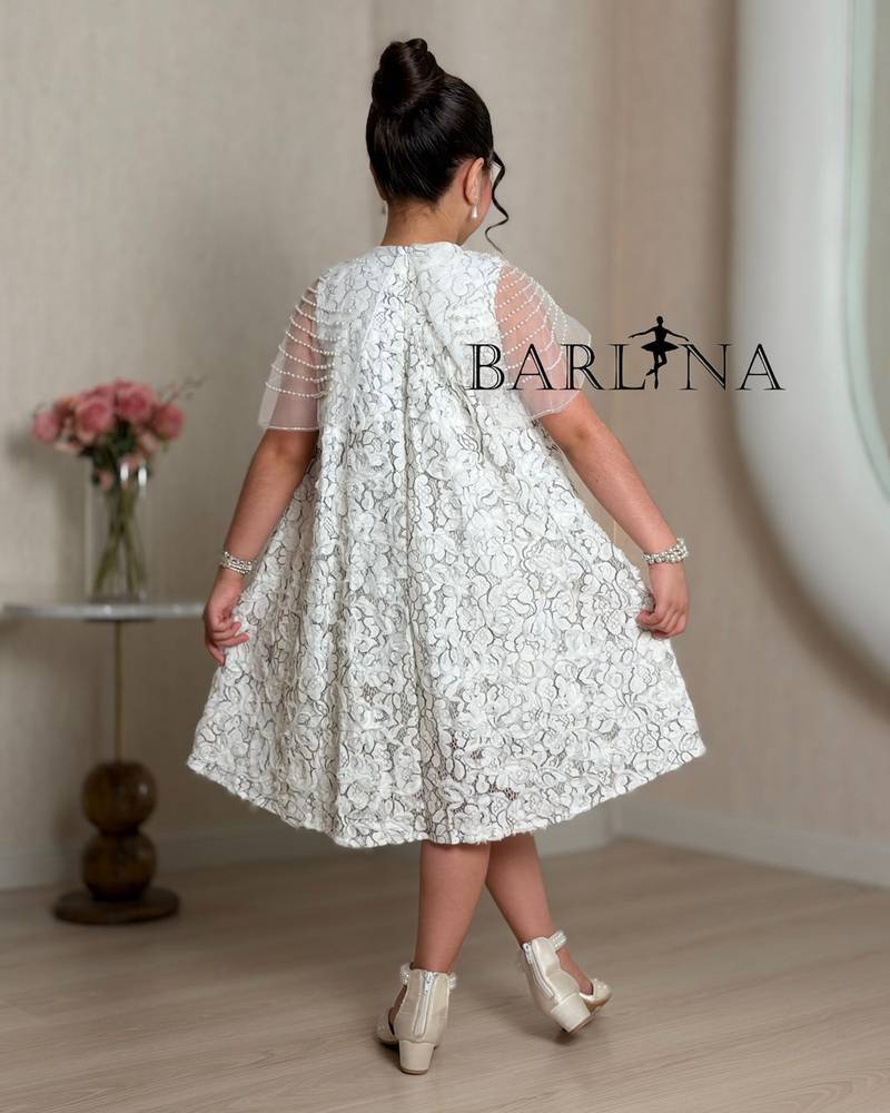 White lace girl's dress with a black rose