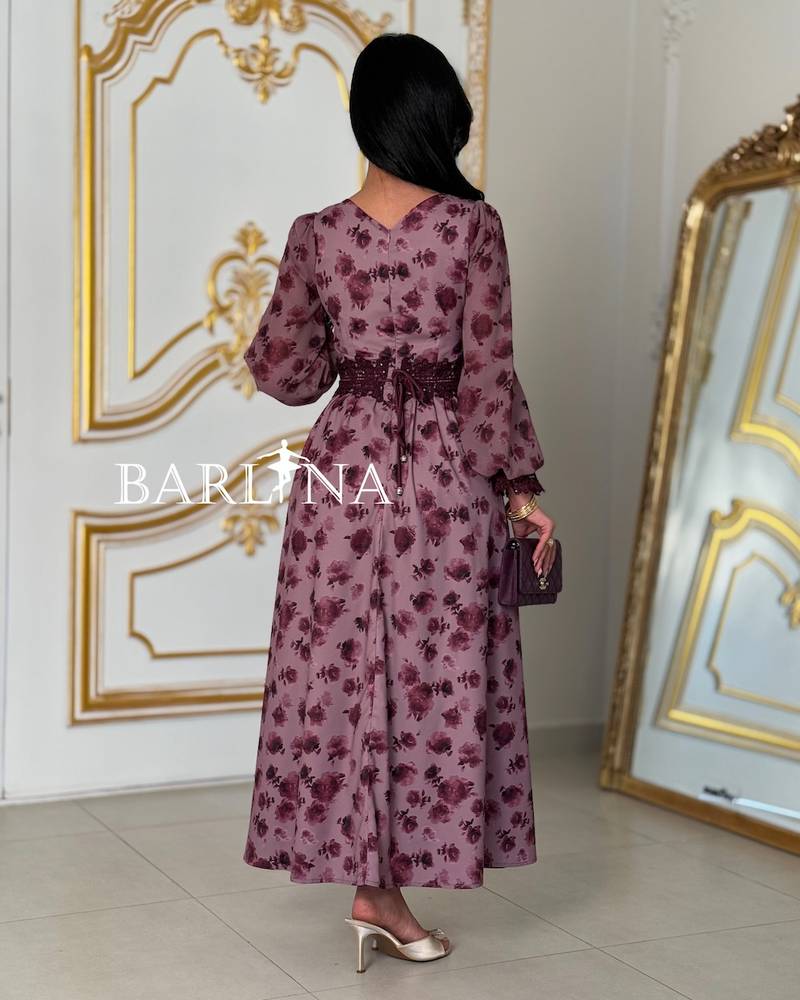 A mauve dress with a floral print and crochet details